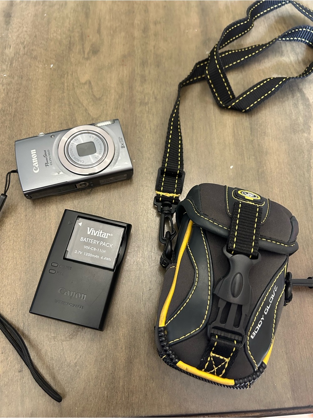 Canon Powershot ELPH 160 8x zoom Digital Camera with Black and Yellow Carry Case
